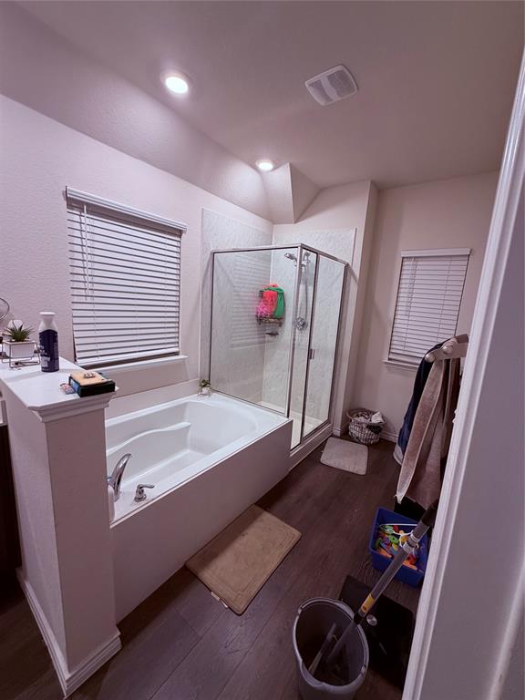 2001 Juniper Pass Way Mesquite, TX 75149 - Photo 10 of 12 Full bathroom with a shower stall, a bath, and dark wood-style flooring