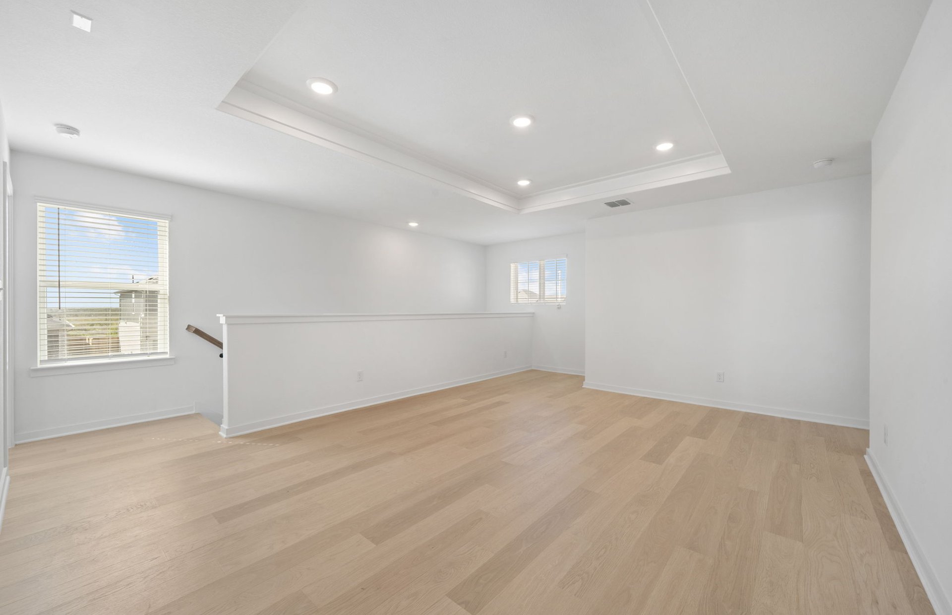 608 Rubber Tree Way Buda, TX 78610 - Photo 19 of 29 an empty room with windows