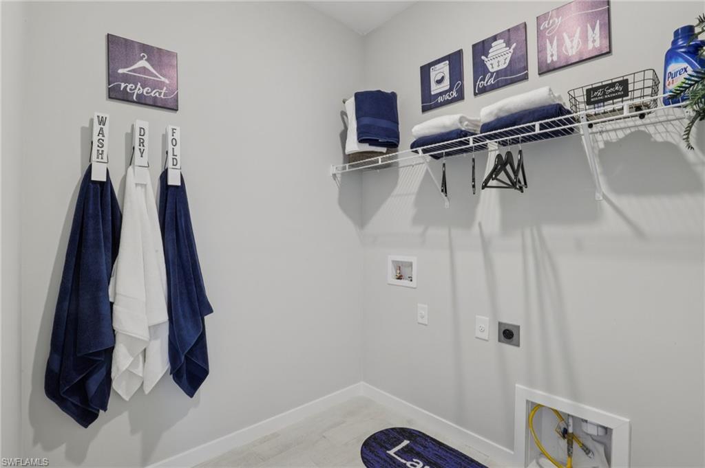 17899 Shade Tree Loop Punta Gorda, FL 33982 - Photo 16 of 47 a close view of walk in closet