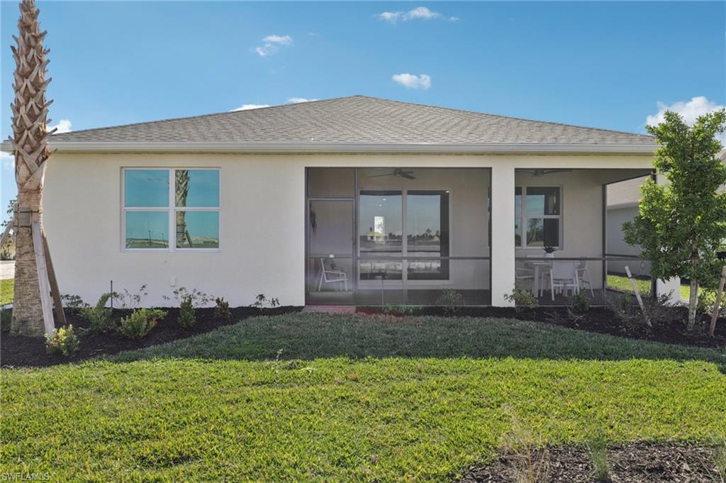 17899 Shade Tree Loop Punta Gorda, FL 33982 - Photo 23 of 47 a view of a house with backyard and garden