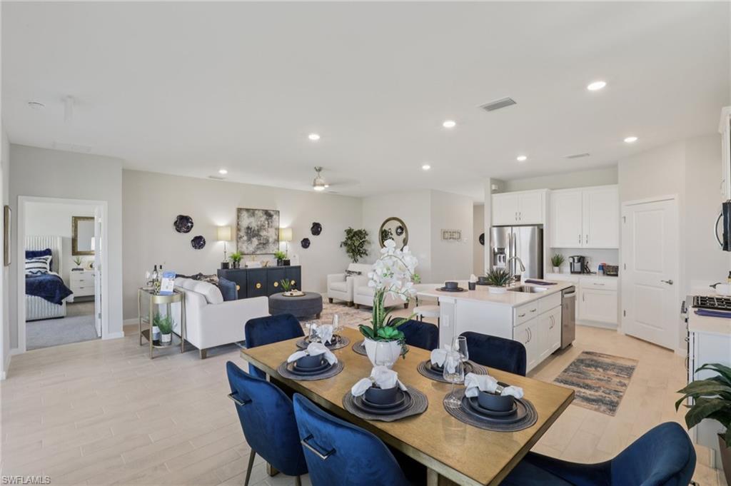17899 Shade Tree Loop Punta Gorda, FL 33982 - Photo 7 of 47 a living room with furniture and a table