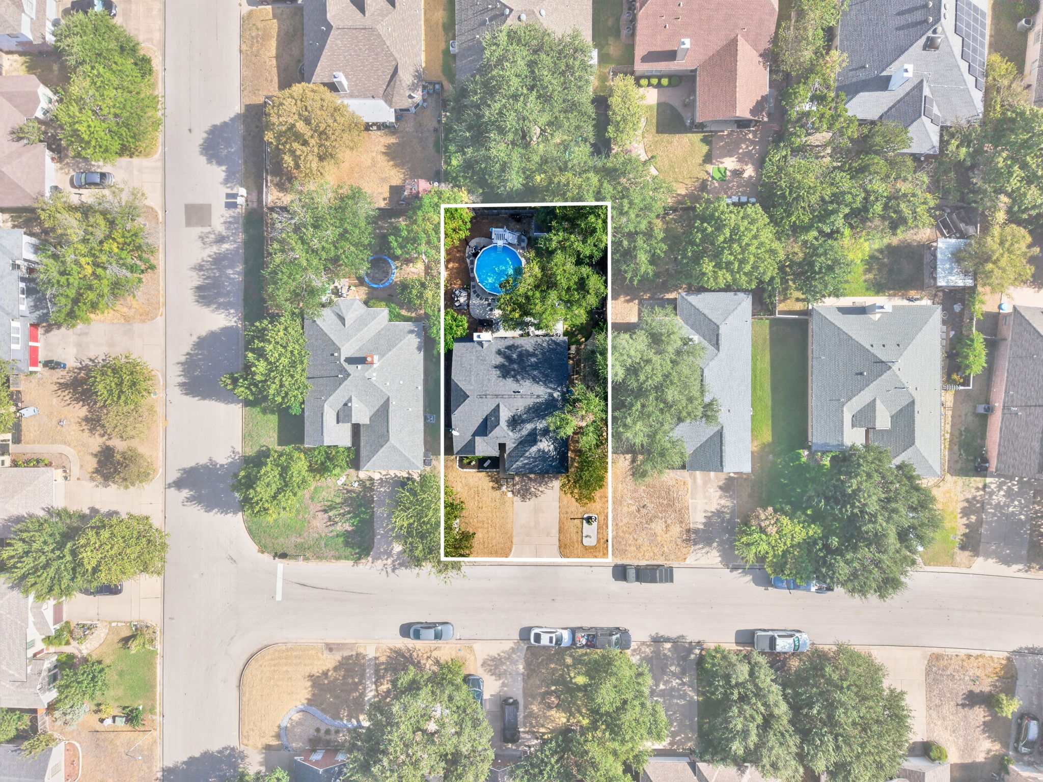806 Mountain Ridge Drive Leander, TX 78641 - Photo 35 of 40 An aerial perspective highlights a private backyard complete with an inviting swimming pool.