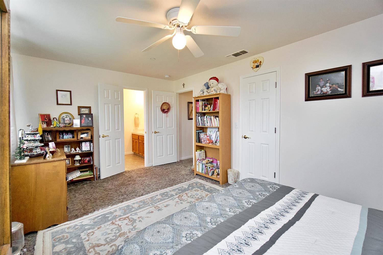 16254 Road 37 Madera, CA 93636 - Photo 18 of 36 a view of a bedroom with workspace and window