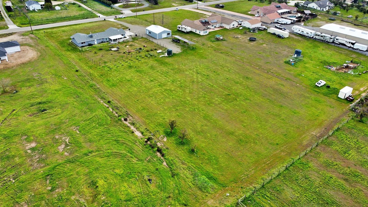 16254 Road 37 Madera, CA 93636 - Photo 32 of 36 a view of a golf course with a street