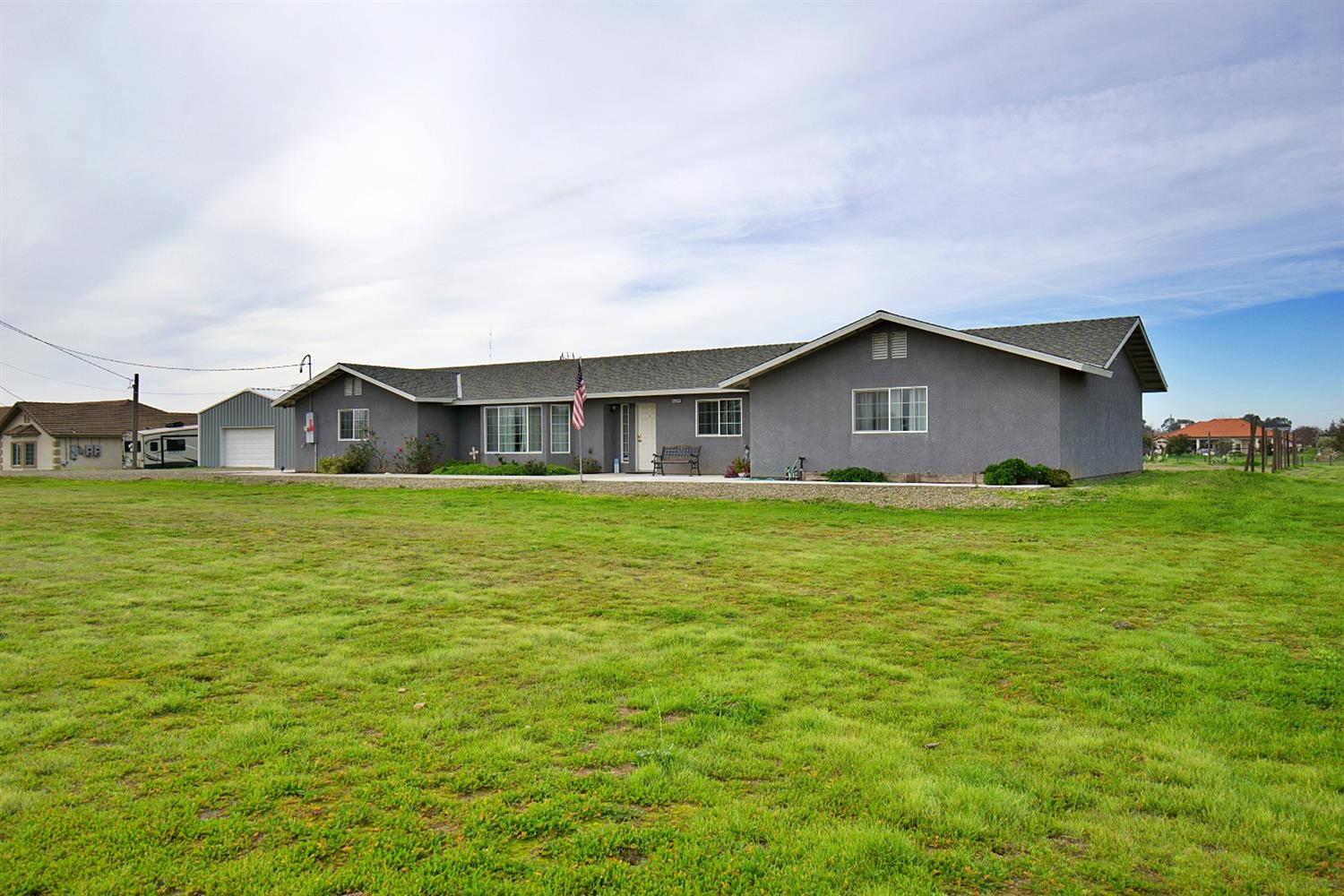 16254 Road 37 Madera, CA 93636 - Photo 4 of 36 a house view with a garden space