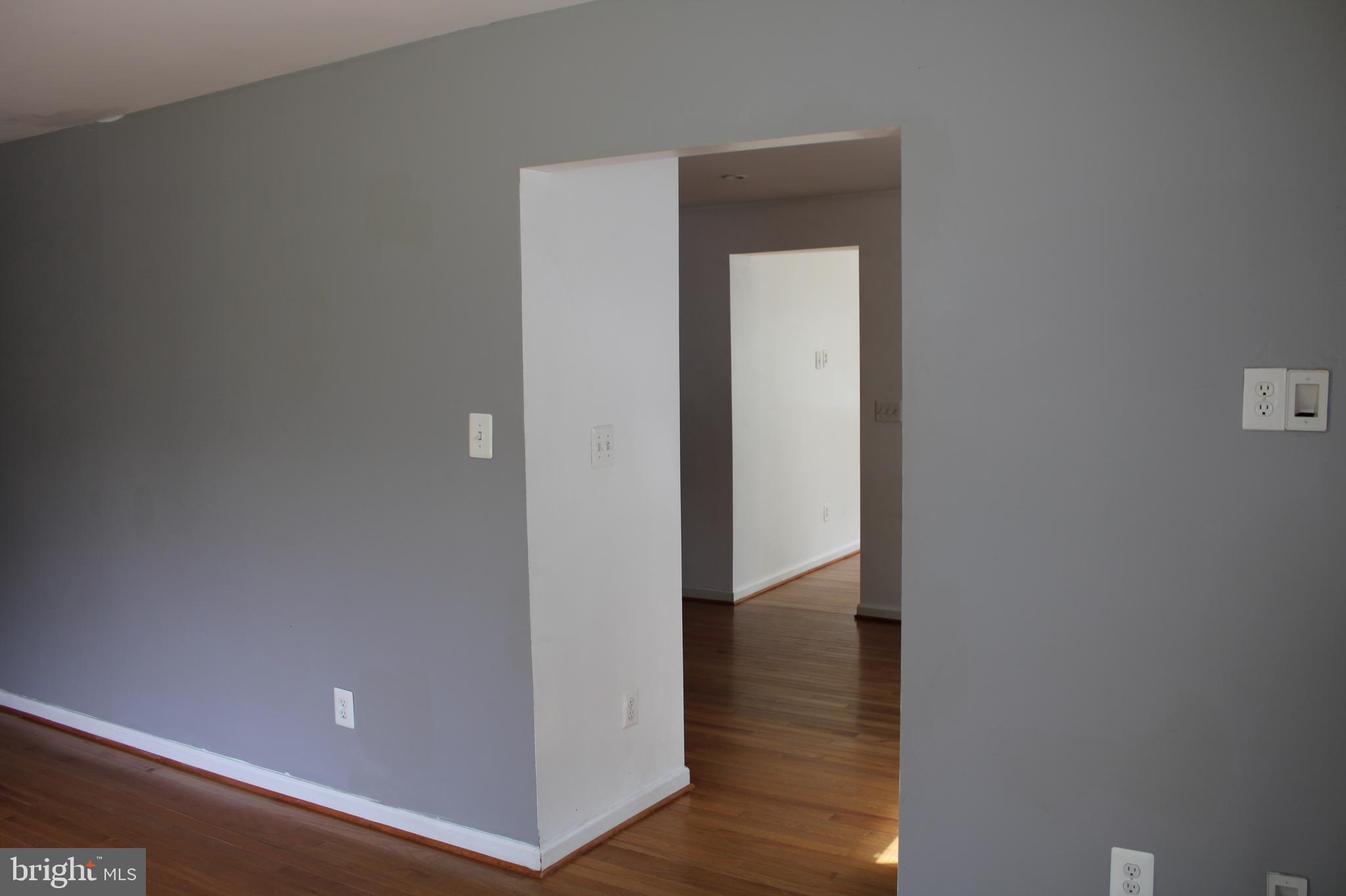 19115 Wayne Drive Triangle, VA 22172 - Photo 12 of 47 a view of a hallway with wooden floor