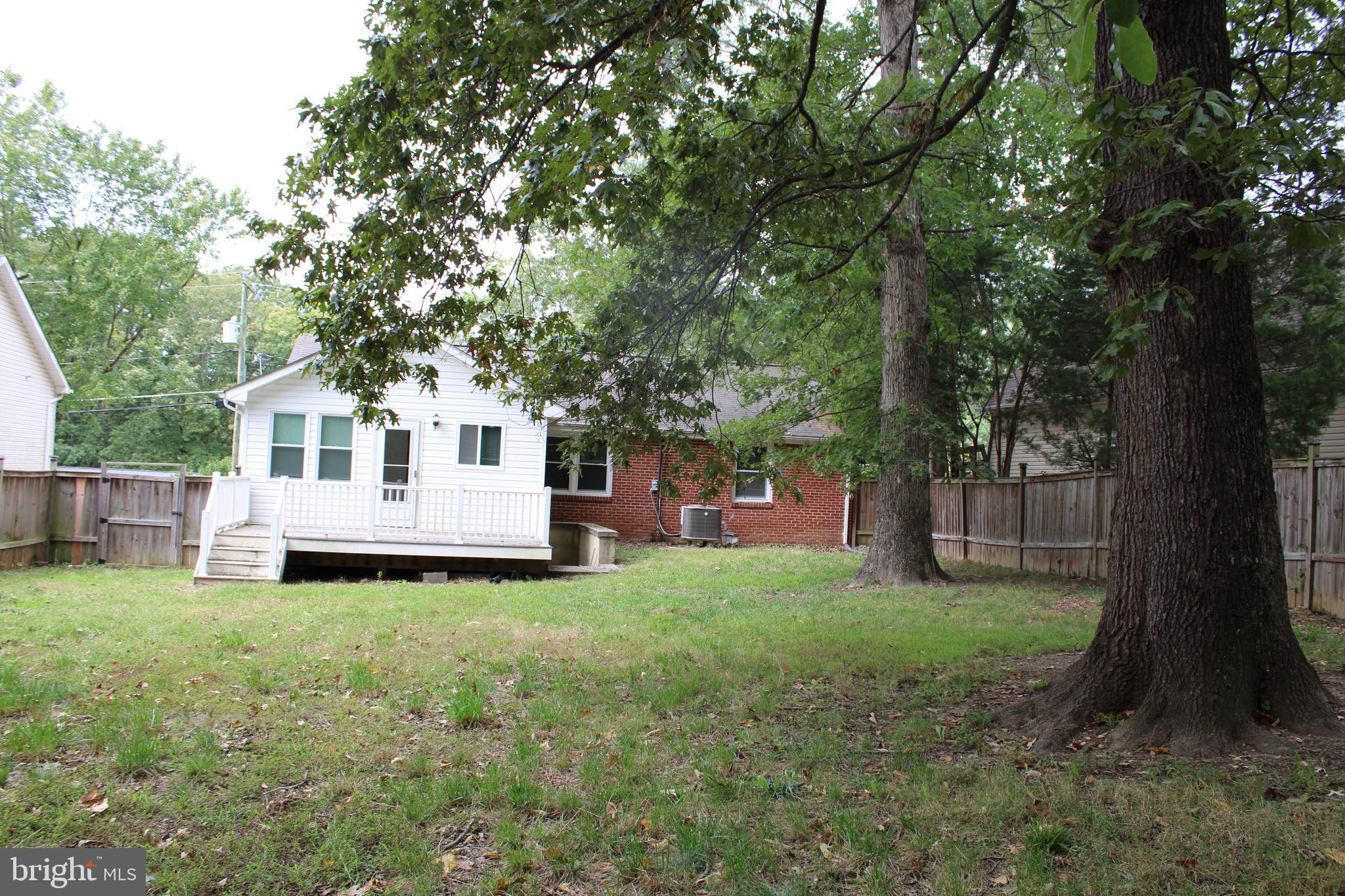 19115 Wayne Drive Triangle, VA 22172 - Photo 44 of 47 a view of a house with a yard