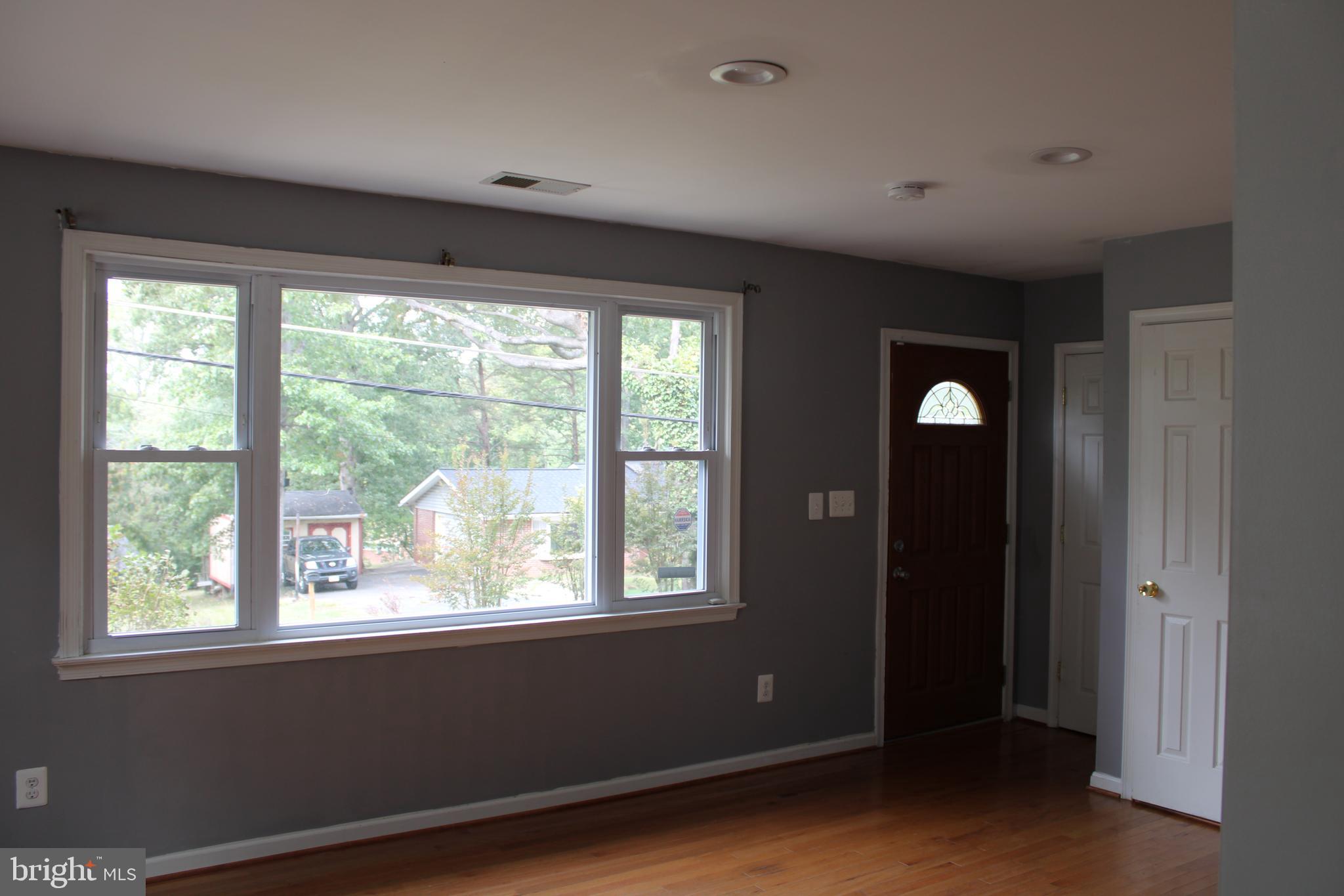 19115 Wayne Drive Triangle, VA 22172 - Photo 8 of 47 a view of an empty room with a window