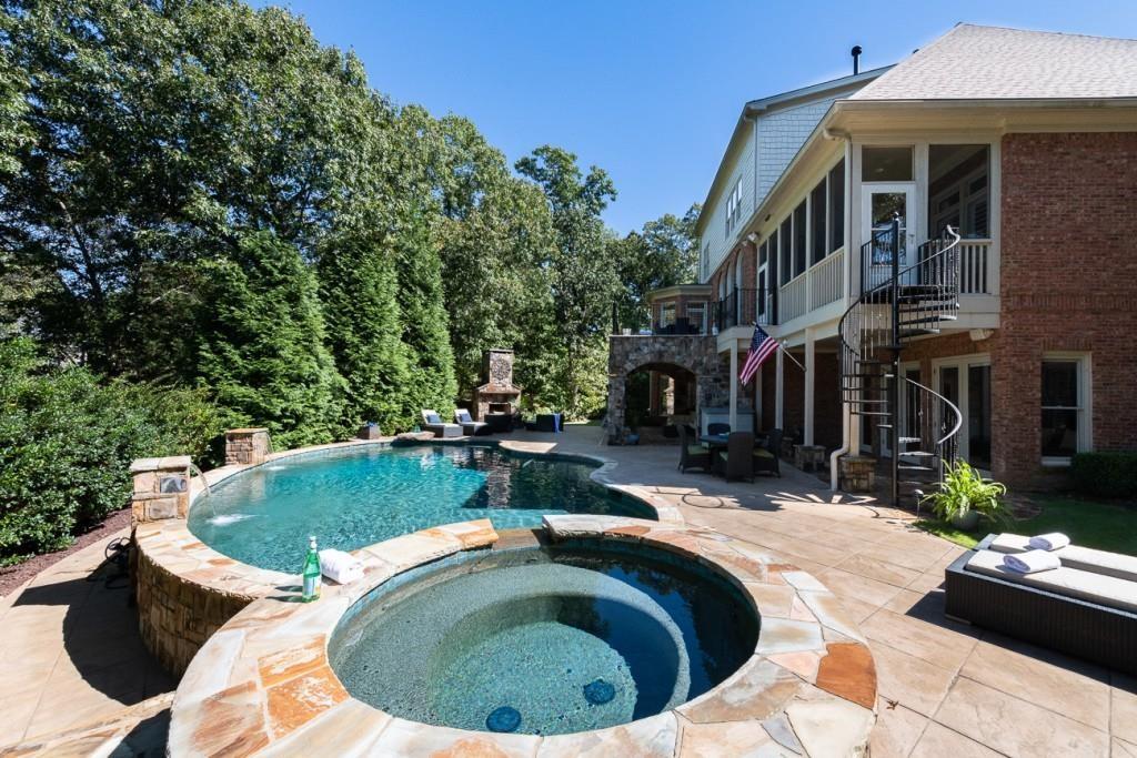 165 Autry Trail Alpharetta, GA 30022 - Photo 59 of 70 a view of outdoor space yard swimming pool and patio