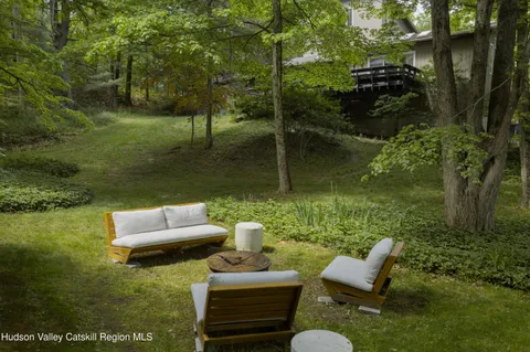 a garden view with a seating space