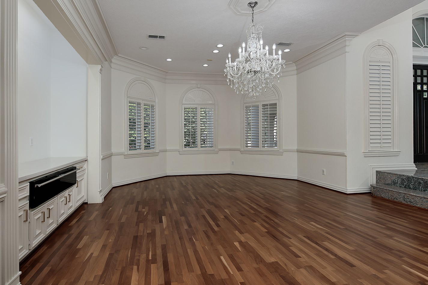 23508 Twin Oaks Drive Spring, TX 77389 - Photo 13 of 50 a view of an empty room with wooden floor and a window