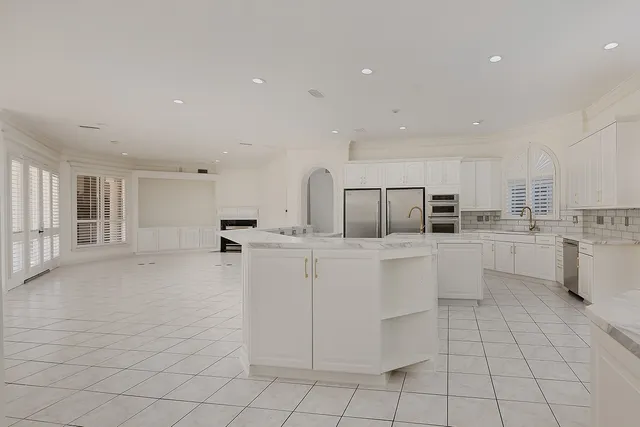 a bathroom with a bathtub and shower