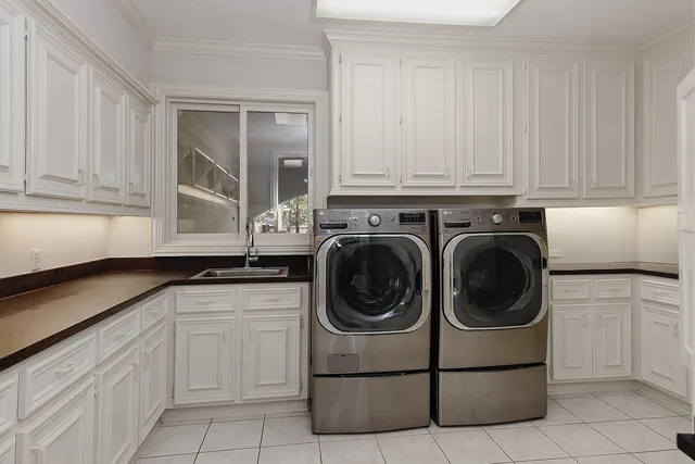 a view of a livingroom with a ceiling fan and window
