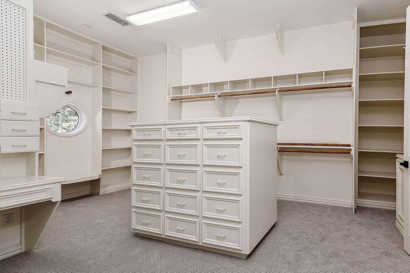 23508 Twin Oaks Drive Spring, TX 77389 - Photo 26 of 50 a view of walk in closet with empty racks