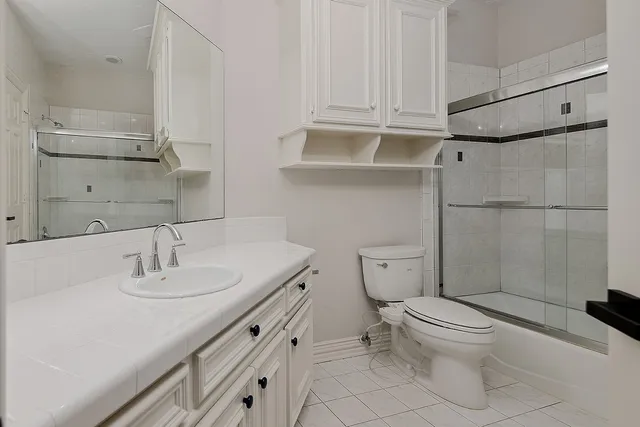 a kitchen with stainless steel appliances granite countertop a stove and a refrigerator