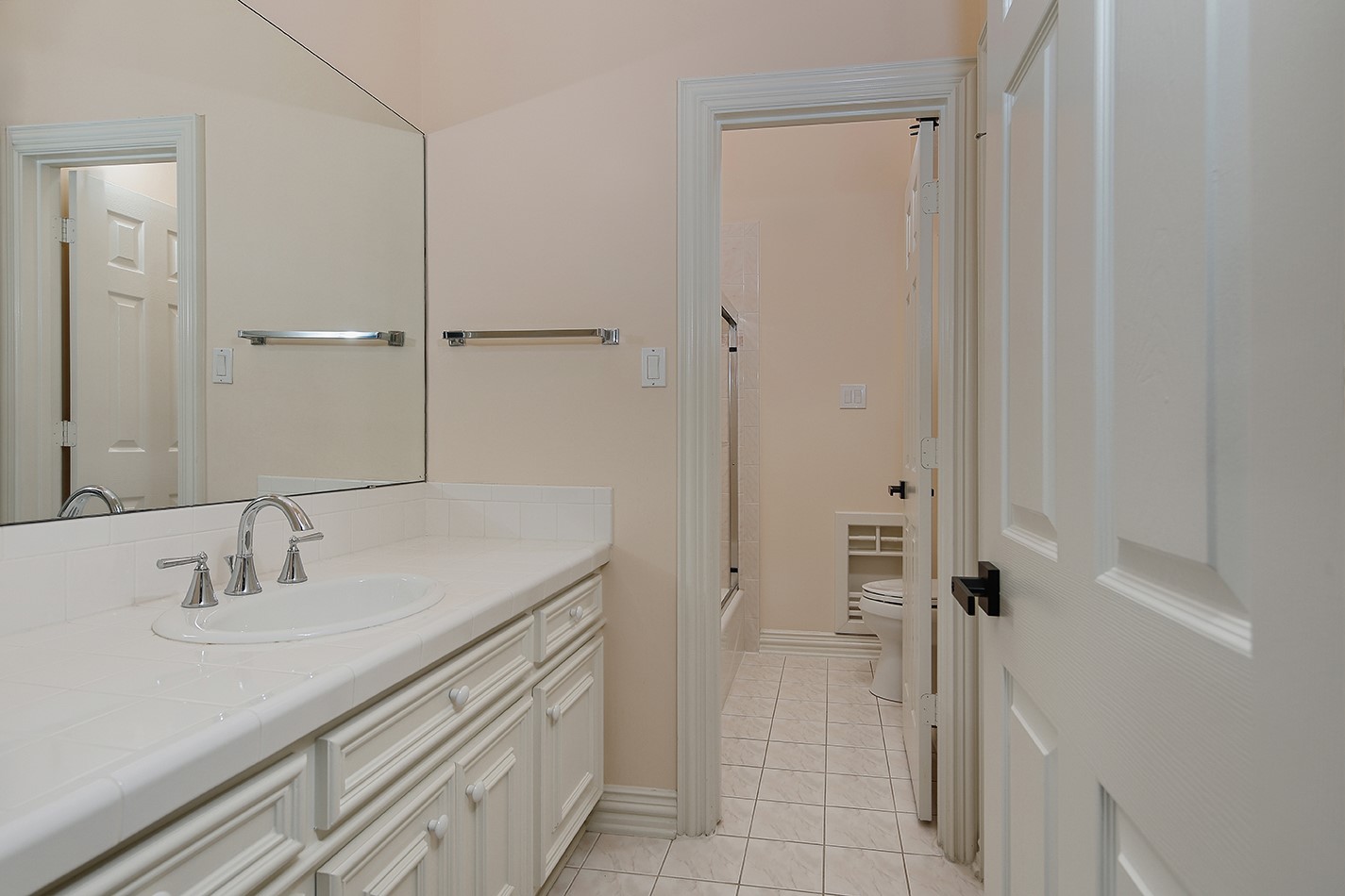 23508 Twin Oaks Drive Spring, TX 77389 - Photo 42 of 50 a bathroom with a sink and a mirror