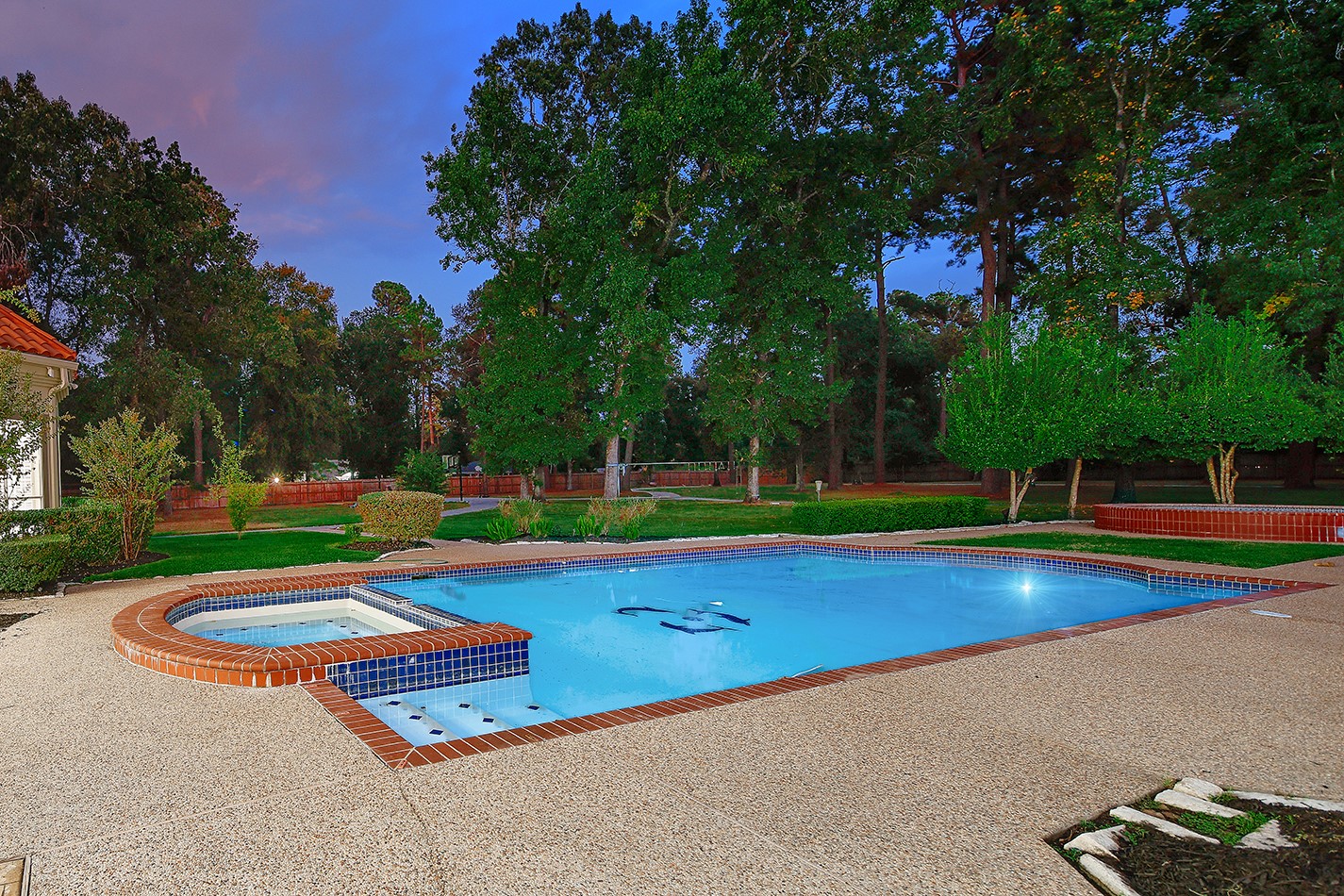 23508 Twin Oaks Drive Spring, TX 77389 - Photo 46 of 50 a view of a swimming pool with an outdoor space and seating area