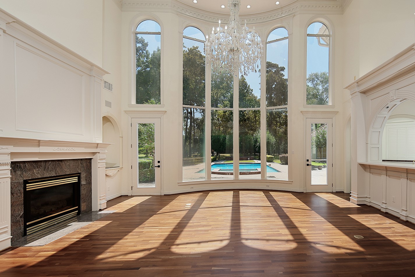 23508 Twin Oaks Drive Spring, TX 77389 - Photo 8 of 50 a view of a room with a large window and chandelier