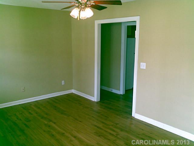 2201 Dawn Ridge Monroe, NC 28110 - Photo 6 of 8 an empty room with a windows and closet