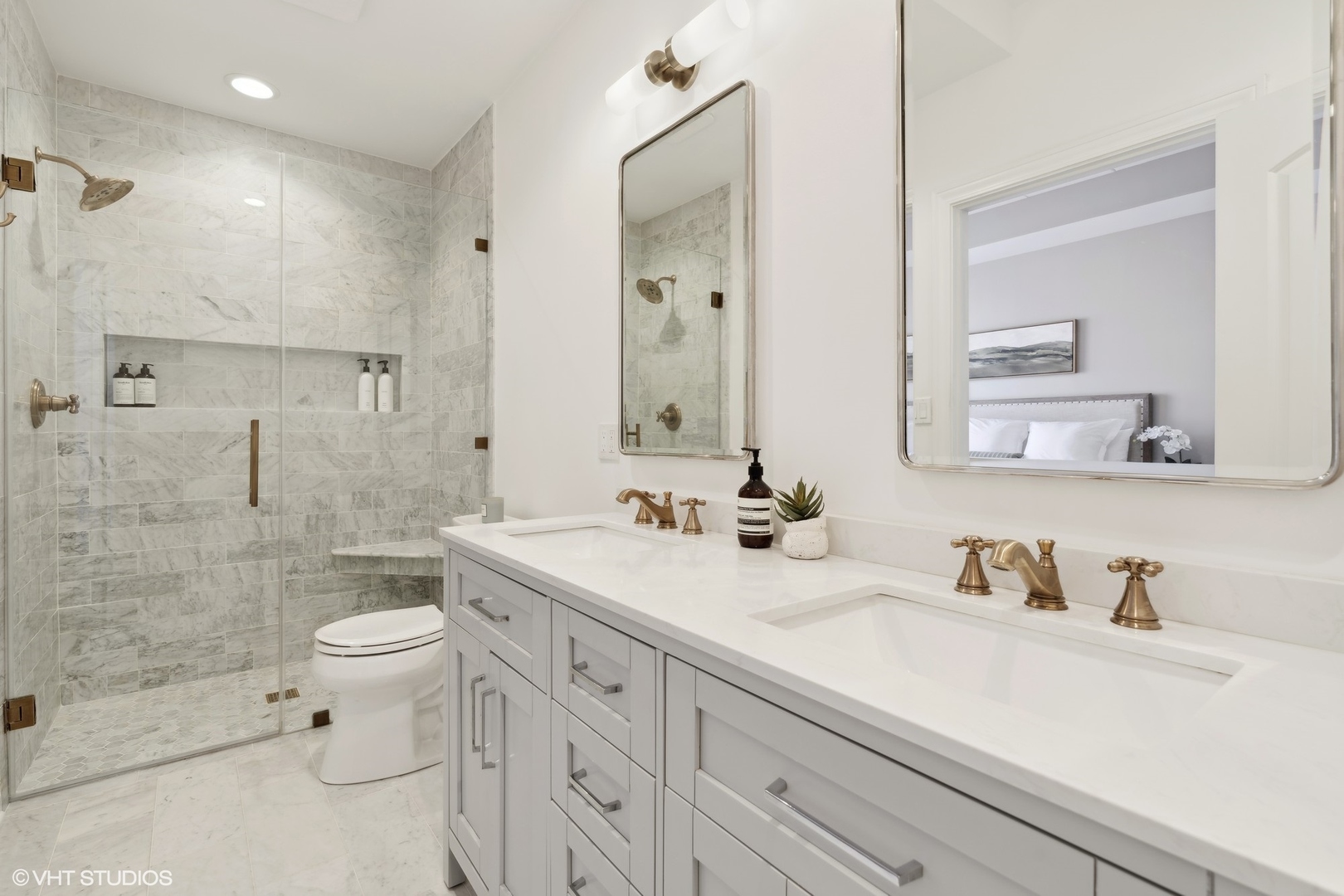 1332 West Madison Street, Unit 3E Chicago, IL 60607 - Photo 10 of 14 a bathroom with a sink a toilet and shower
