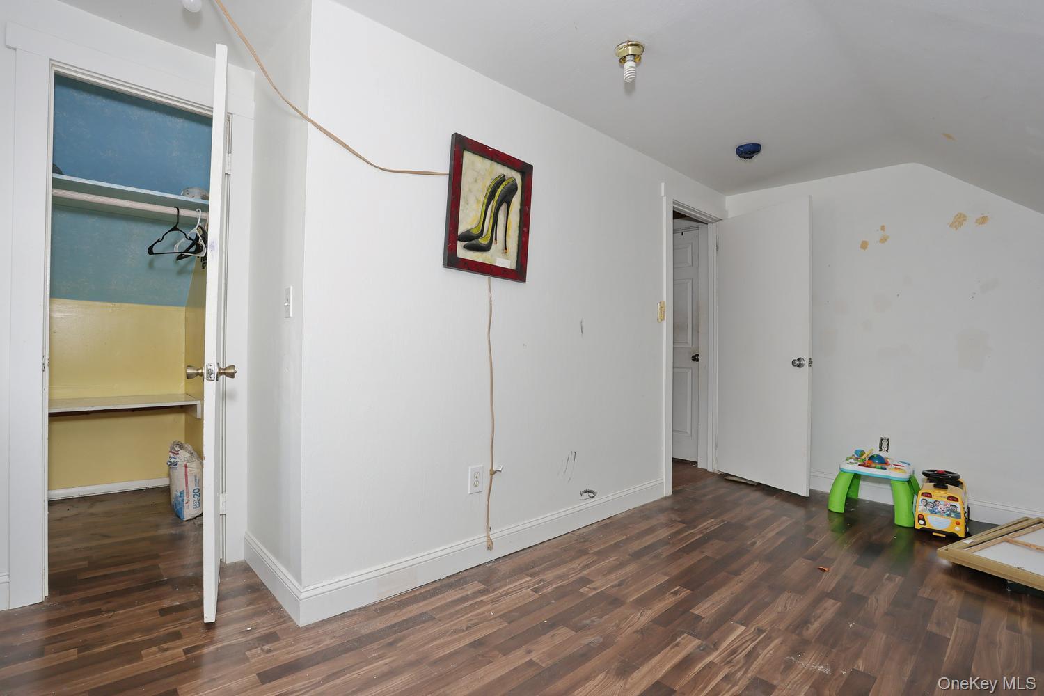29 Fairview Avenue Spring Valley, NY 10977 - Photo 19 of 19 a view of a room with wooden floor