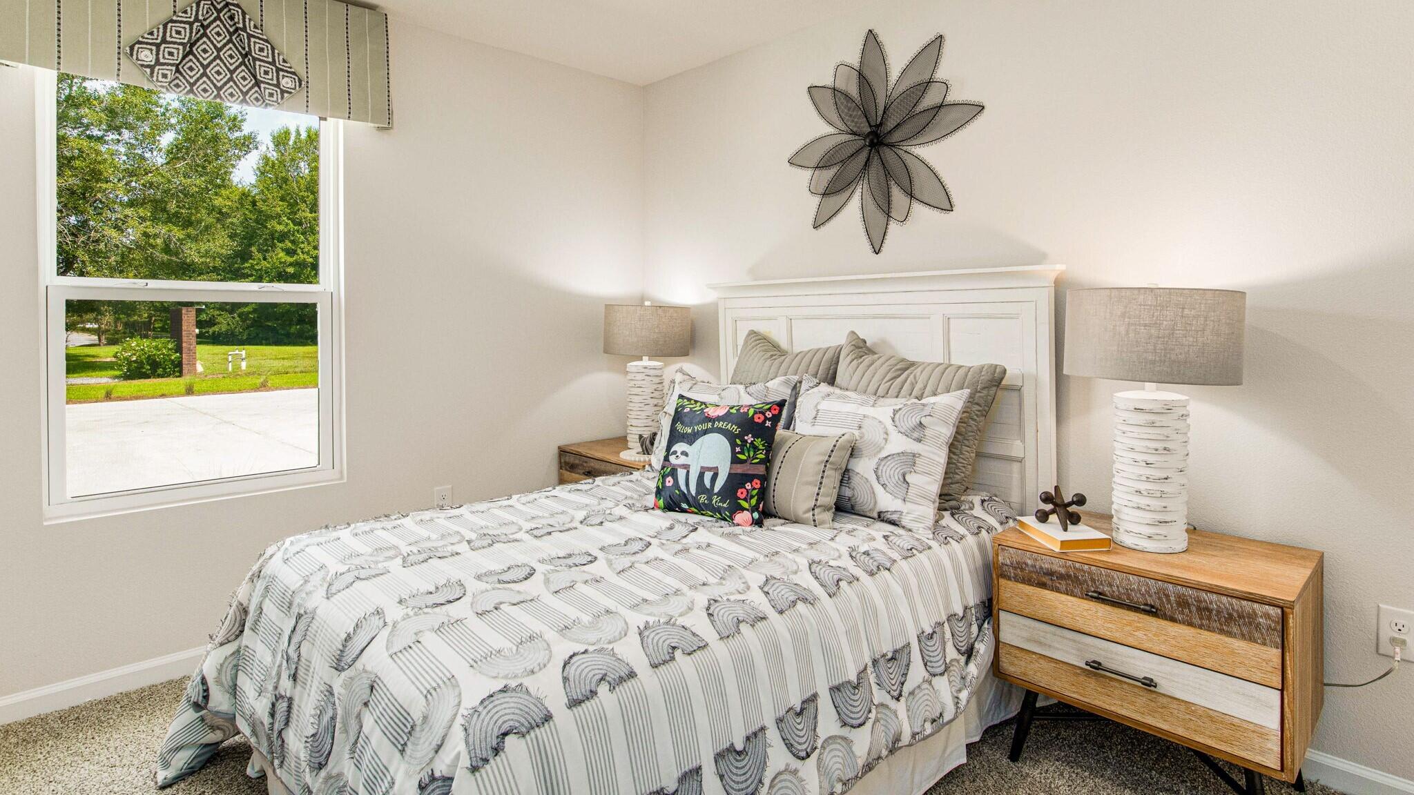 3406 Phoenix Court Crestview, FL 32539 - Photo 18 of 31 a bedroom with a bed and window