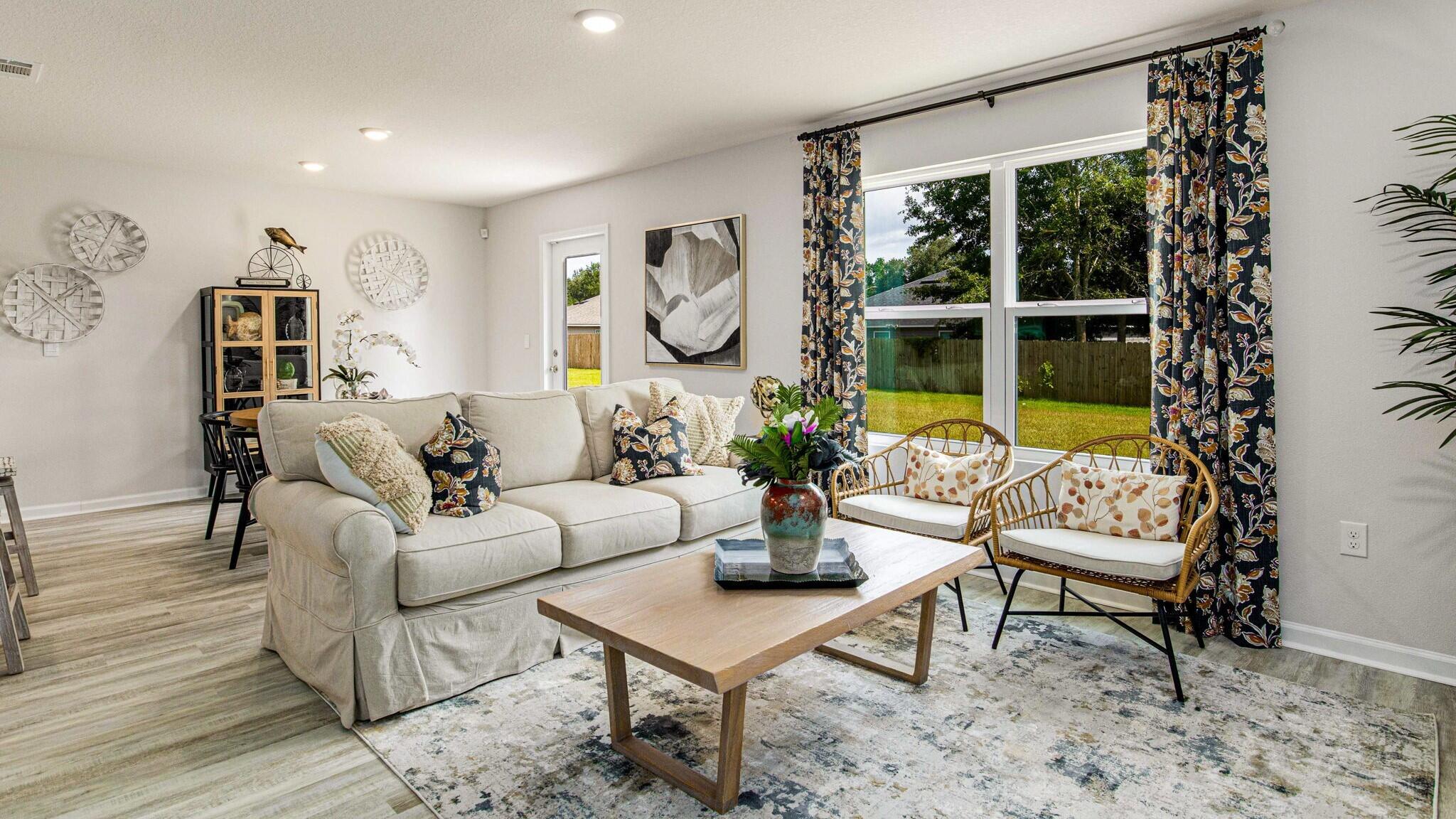 3406 Phoenix Court Crestview, FL 32539 - Photo 10 of 31 a living room with furniture and a large window