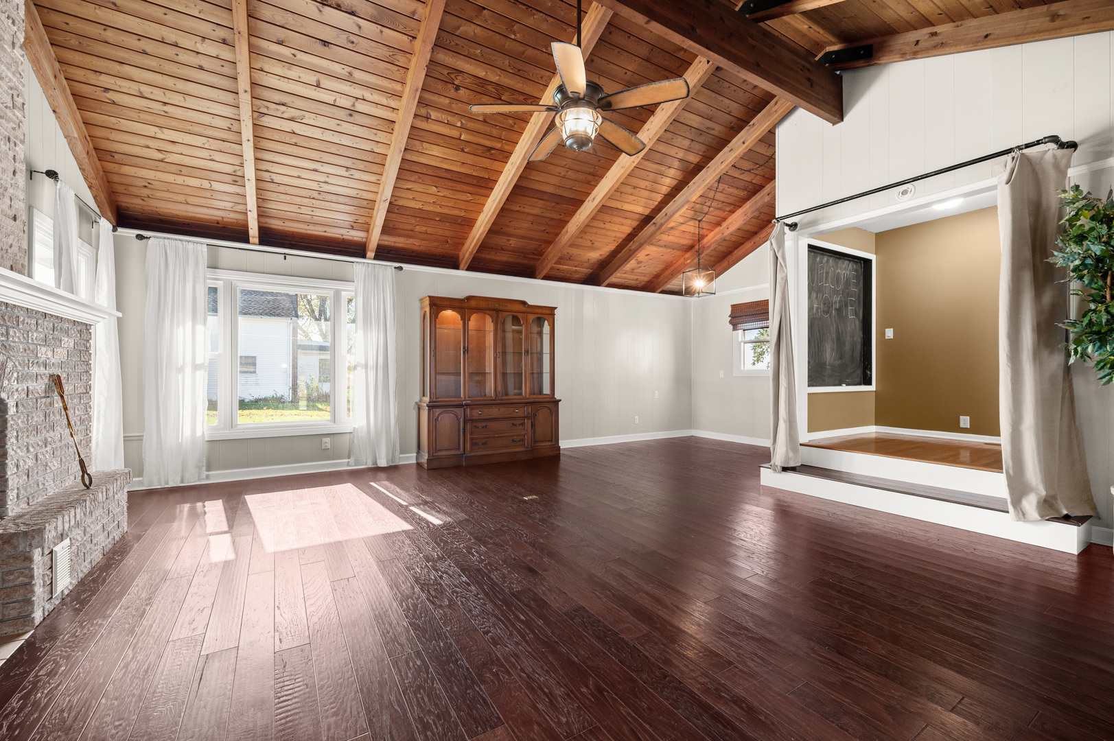 29290 Glidden Road Kingston, IL 60145 - Photo 15 of 38 a view of an empty room with wooden floor and a window