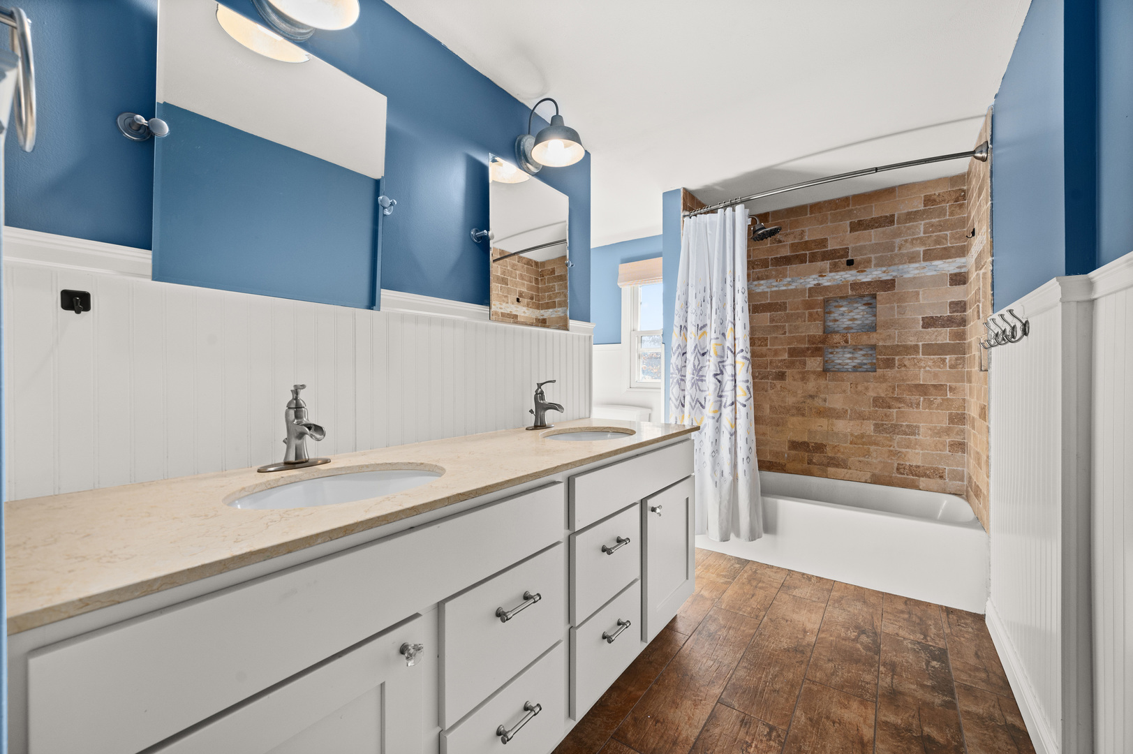 29290 Glidden Road Kingston, IL 60145 - Photo 23 of 38 a bathroom with a double vanity sink and a mirror