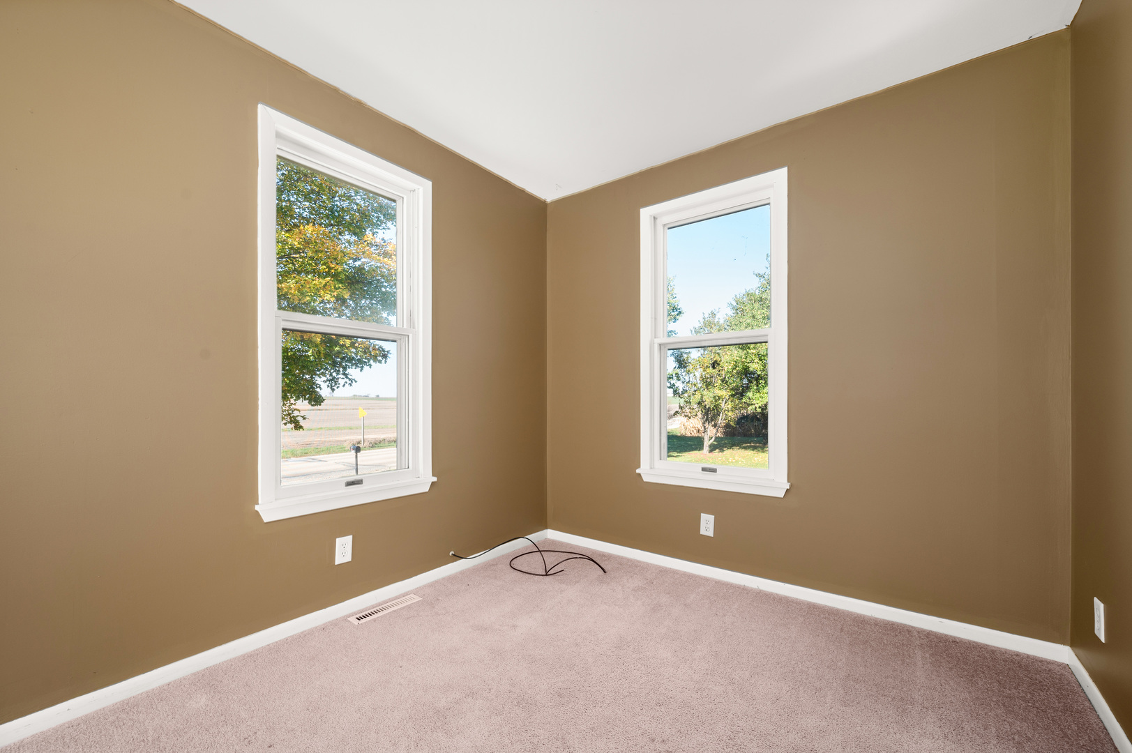 29290 Glidden Road Kingston, IL 60145 - Photo 6 of 38 a view of an empty room with a window