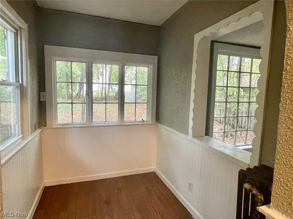 857 Aberdeen Street Akron, OH 44310 - Photo 6 of 23 Unfurnished sunroom with plenty of natural light