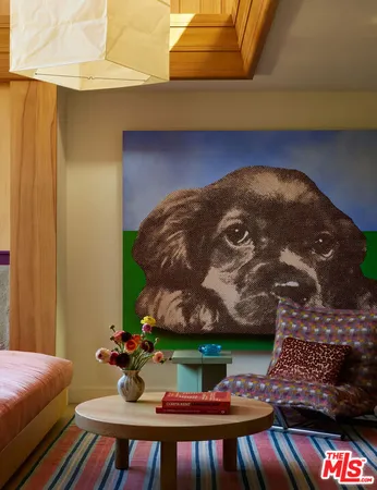 a view of a chairs and table in backyard