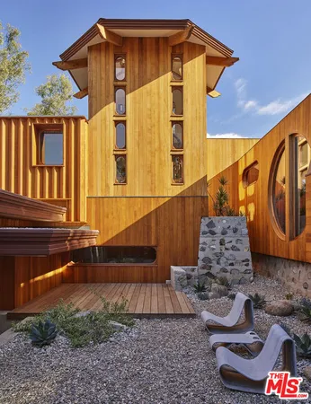 a front view of a house with garage