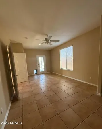 a view of a livingroom with a furniture and a window