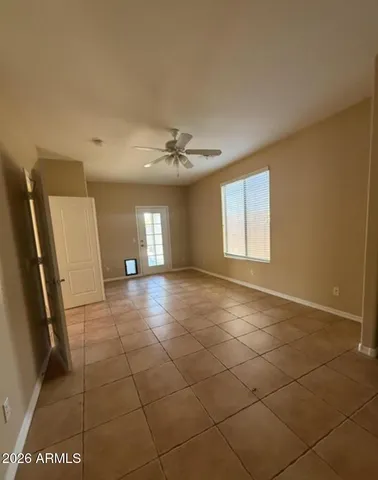 a view of a livingroom with a furniture and a window
