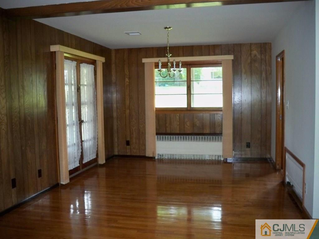 111 Kimberly Road Colonia, NJ 07067 - Photo 3 of 18 a view of an entryway with wooden floor