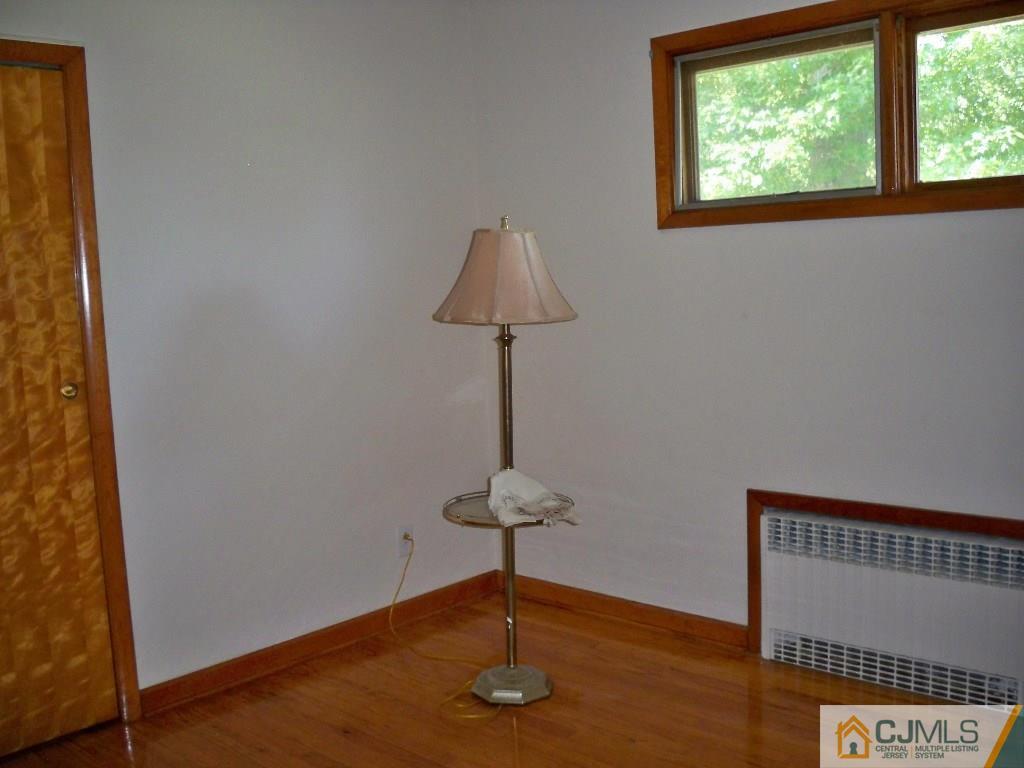 111 Kimberly Road Colonia, NJ 07067 - Photo 9 of 18 a vase of flowers sitting on a table