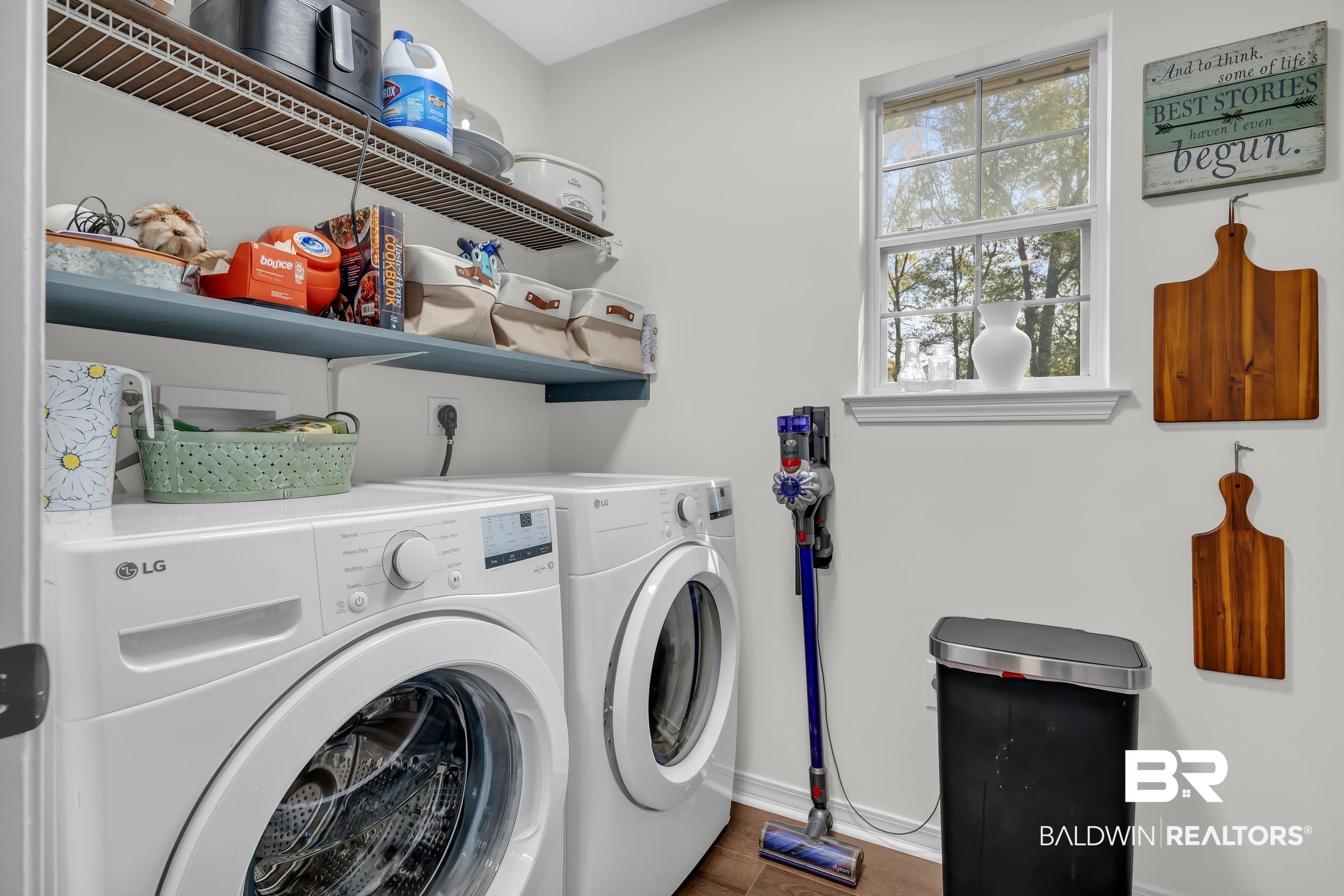 191 Robbins Boulevard Daphne, AL 36526 - Photo 18 of 24 Laundry room featuring washer and dryer and dark wood-type flooring