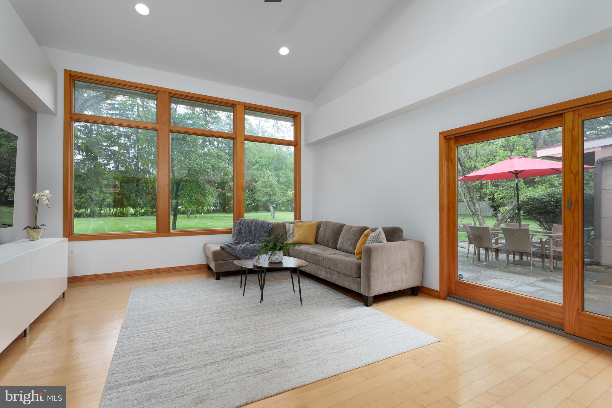 319 Clarksville Road Princeton Junction, NJ 08550 - Photo 19 of 41 a living room with furniture and a large window