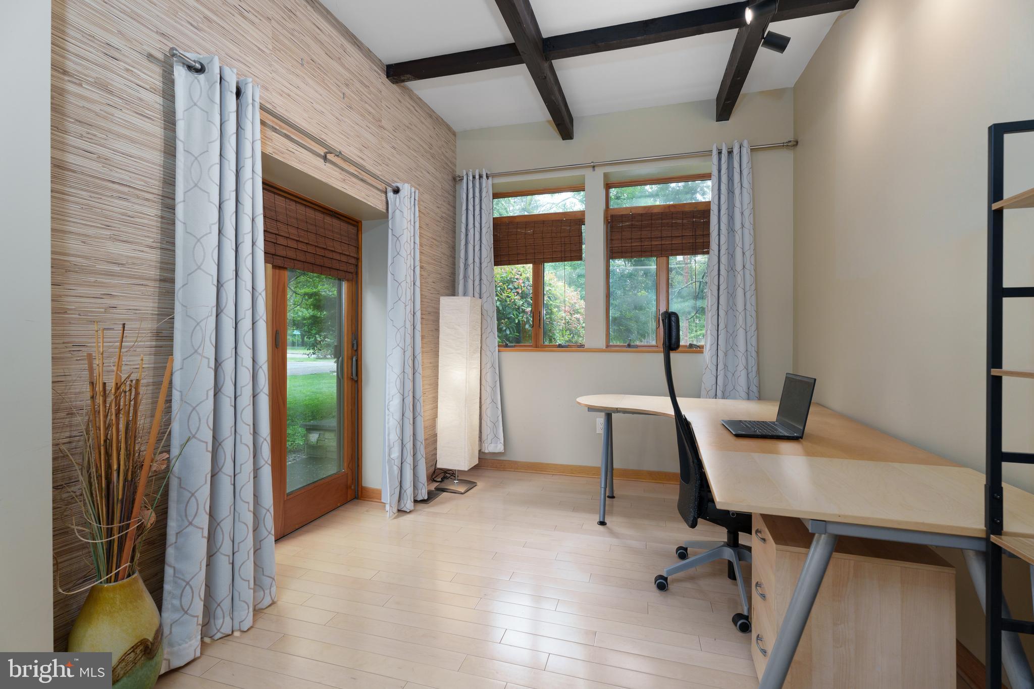 319 Clarksville Road Princeton Junction, NJ 08550 - Photo 25 of 41 a view of a workspace with furniture and a window
