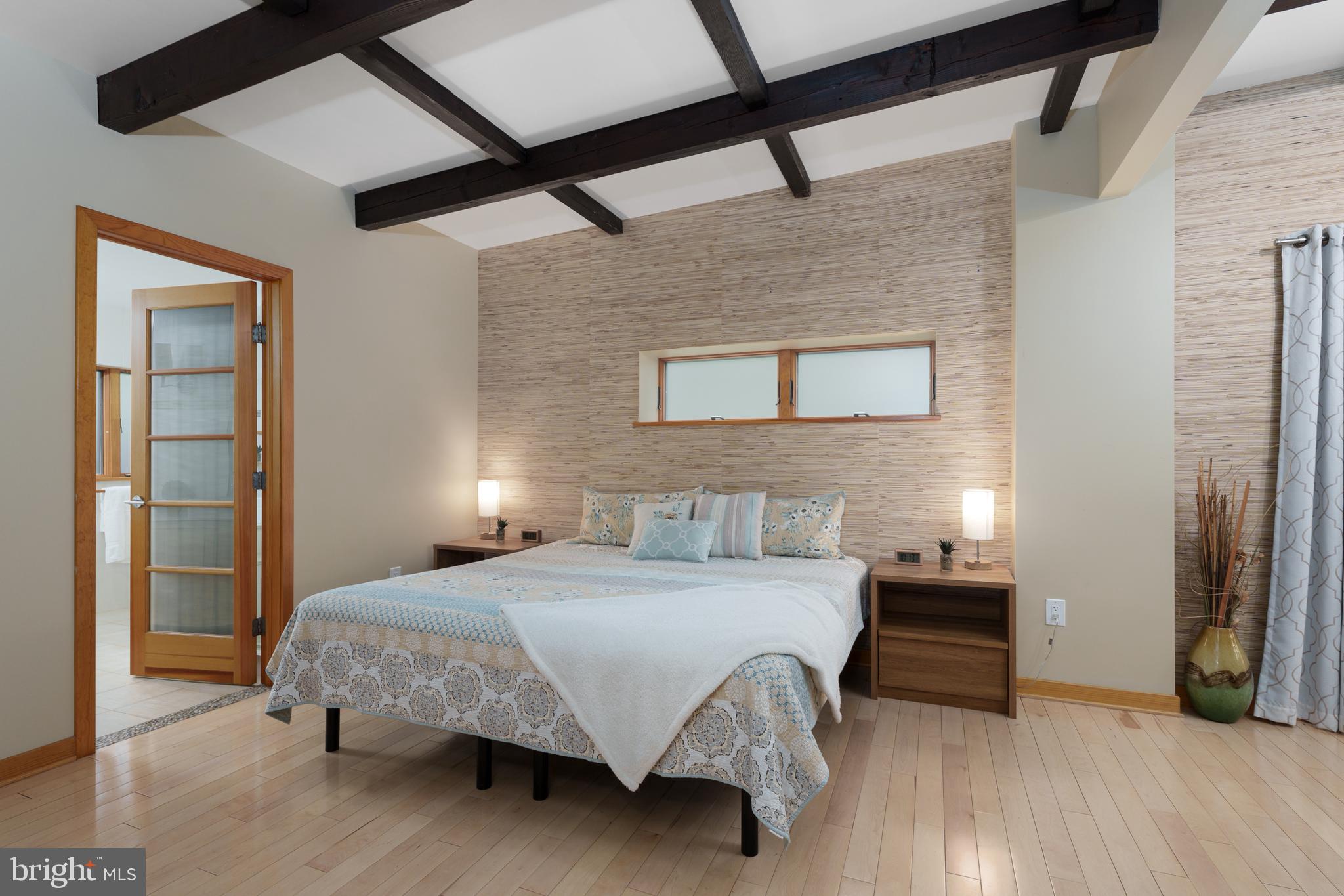 319 Clarksville Road Princeton Junction, NJ 08550 - Photo 26 of 41 a bedroom with a bed and a table