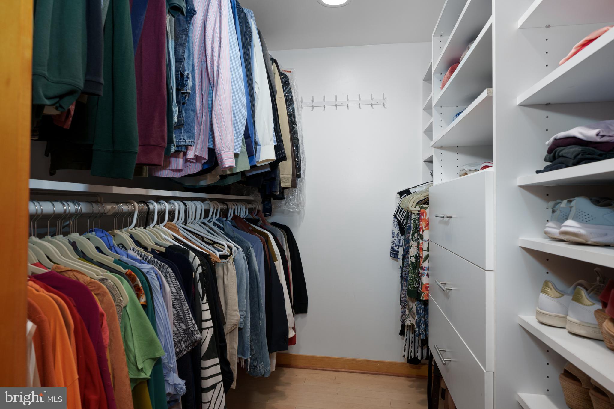 319 Clarksville Road Princeton Junction, NJ 08550 - Photo 29 of 41 a view of walk in closet with clothes and shoes