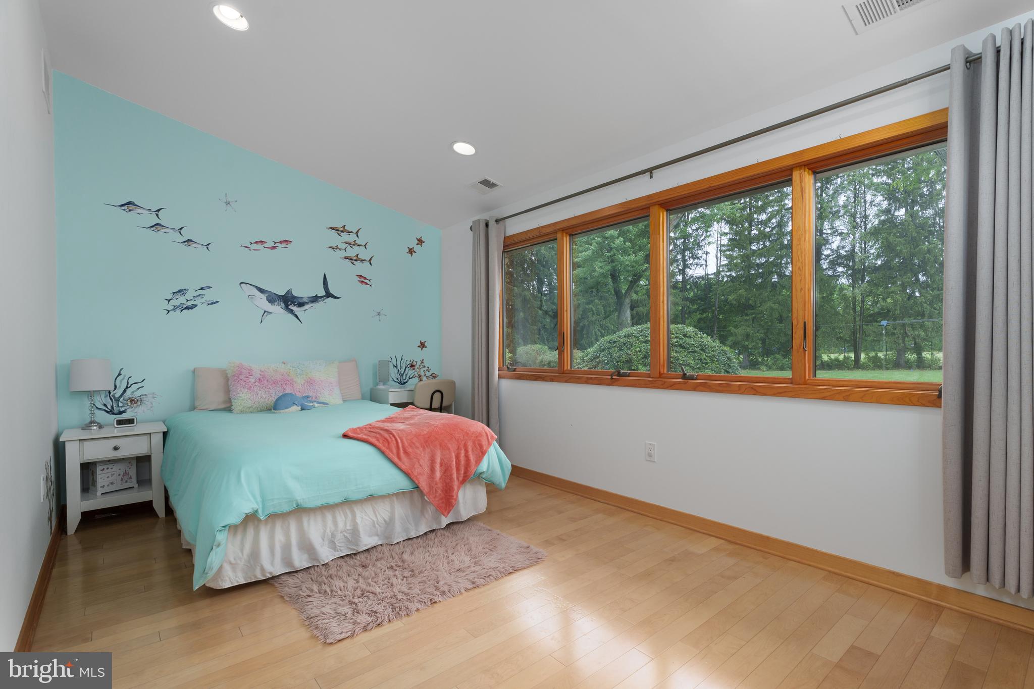 319 Clarksville Road Princeton Junction, NJ 08550 - Photo 31 of 41 a bedroom with a bed and a large window