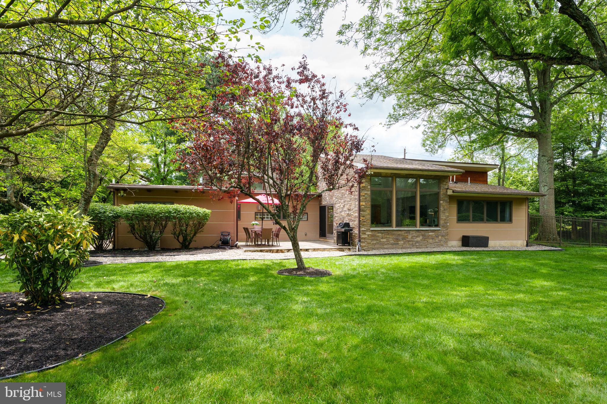 319 Clarksville Road Princeton Junction, NJ 08550 - Photo 37 of 41 a view of a house with a backyard