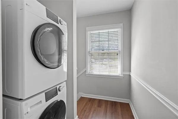 a view of a storage and utility room with washer and dryer