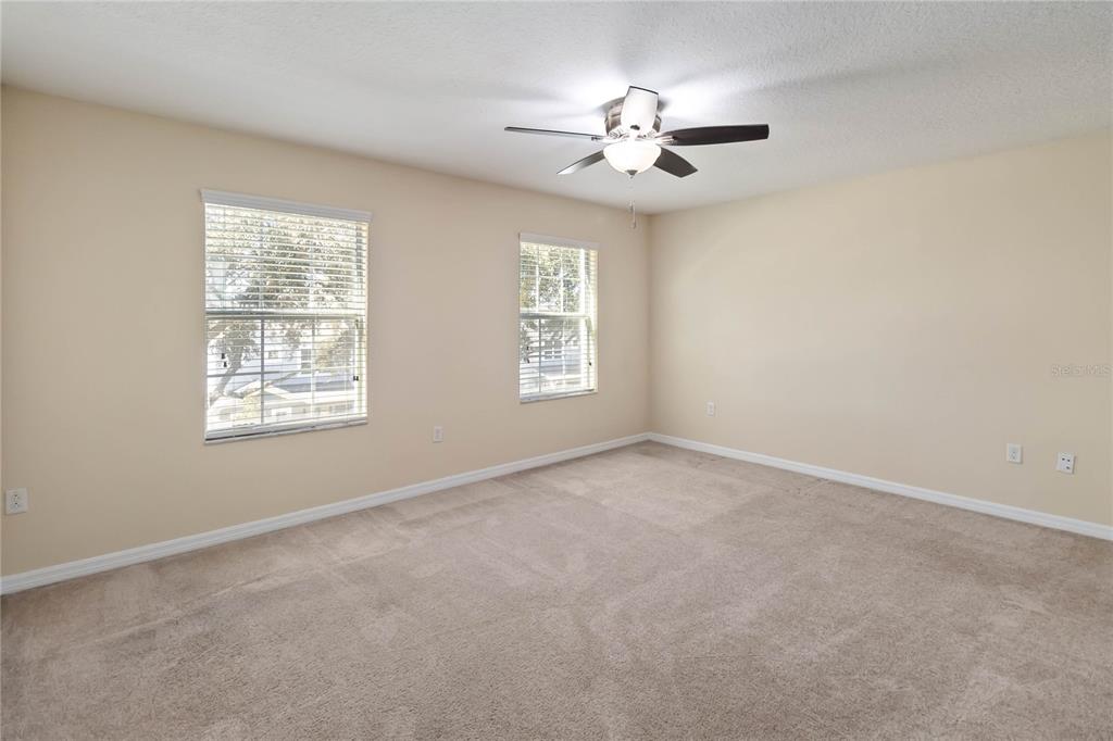 1379 Vasey Road Apopka, FL 32703 - Photo 14 of 21 a view of empty room with windows