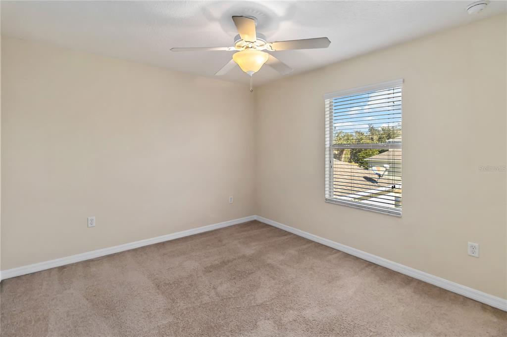 1379 Vasey Road Apopka, FL 32703 - Photo 16 of 21 a view of an empty room with a window