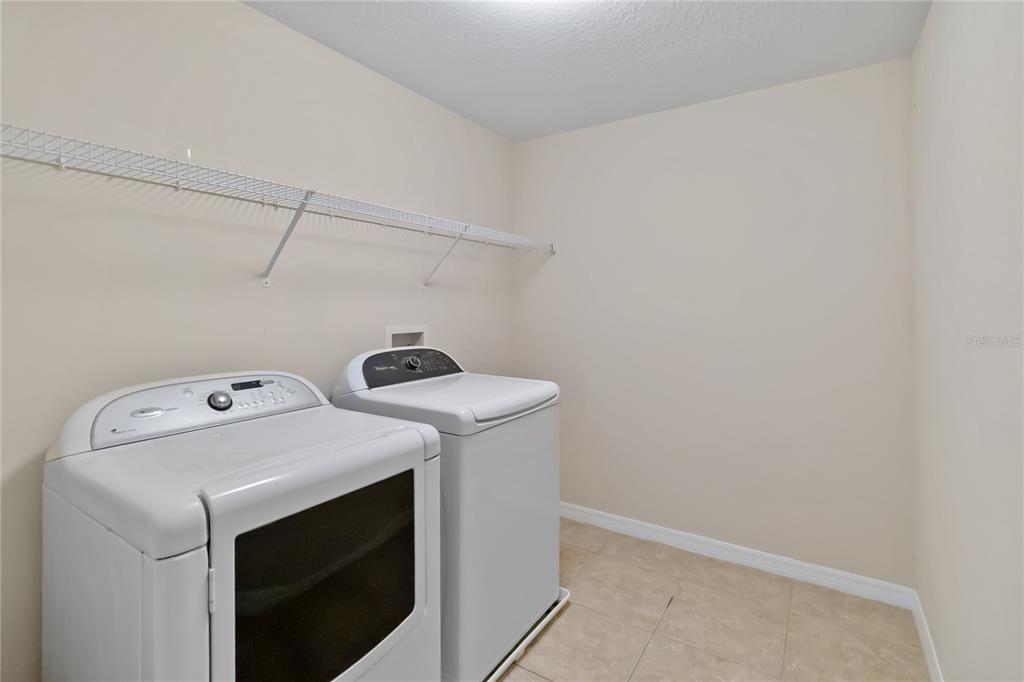 1379 Vasey Road Apopka, FL 32703 - Photo 18 of 21 a utility room with dryer and washer