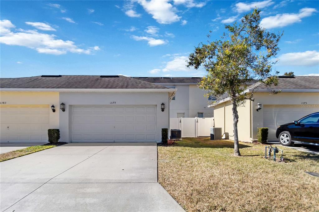 1379 Vasey Road Apopka, FL 32703 - Photo 19 of 21 a view of a house with a yard