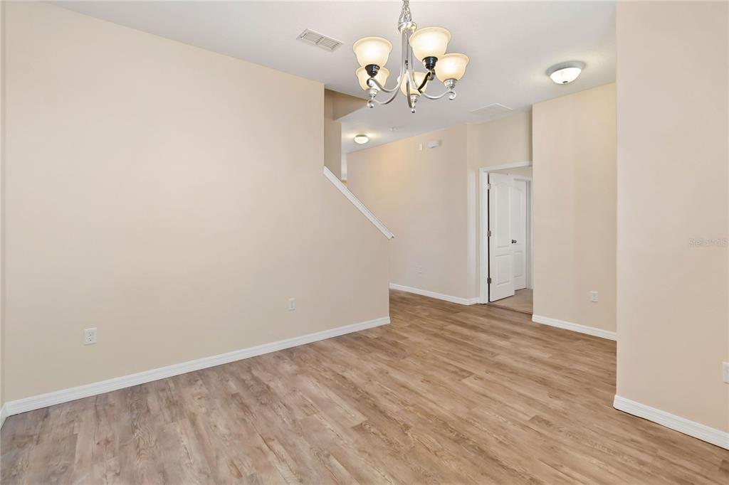 1379 Vasey Road Apopka, FL 32703 - Photo 2 of 21 wooden floor in an empty room